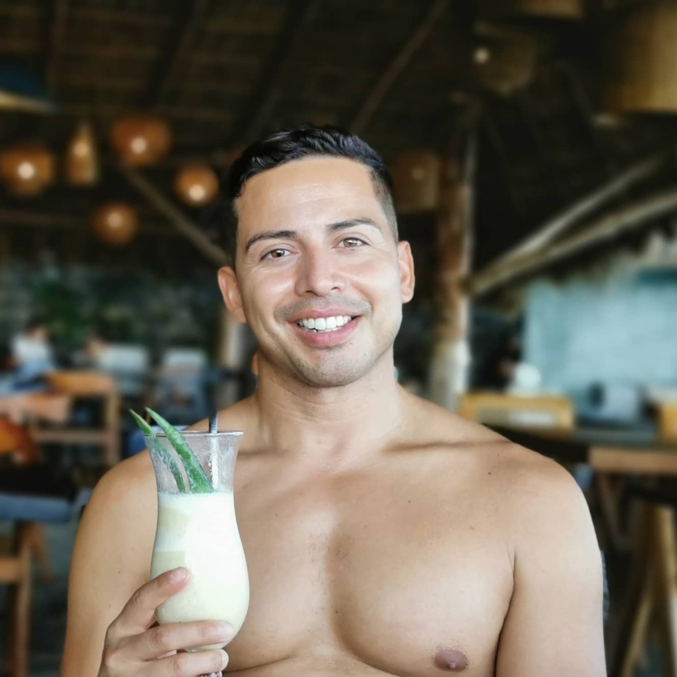 Hector Lopez enjoying a tropical smoothie